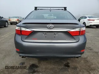 2015 Lexus ES 330 with VIN JTHBK1GGXF2154853, listed as a Copart auction lot 64828665 with 75,119 mi miles and Salvage title. Bid and sale history available at DreamBid. Image 6.