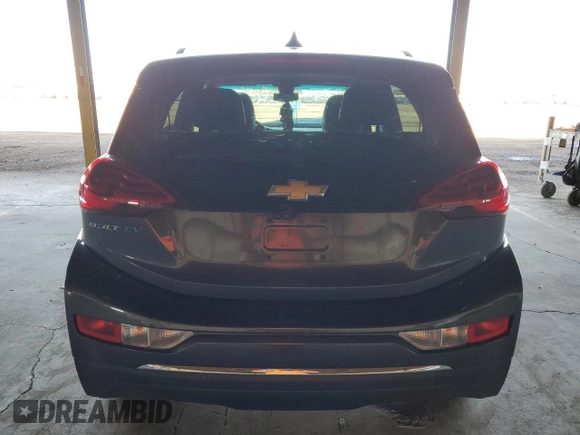 2018 Chevrolet Bolt EV Premier z VIN 1G1FX6S03J4114826, wystawiony jako Copart lot #57649515 z przebiegiem 136 670 mil mil oraz Szkoda całkowita • Salvage title. Historia ofert i sprzedaży dostępna na DreamBid. Obrazek 6.