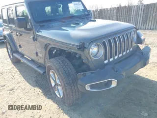 2018 Jeep Wrangler Unlimited Sahara with VIN 1C4HJXEN9JW303094, listed as a IAAI auction lot 41491564 with 66,128 mi miles and . Bid and sale history available at DreamBid. Image 6.