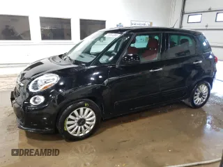 2014 FIAT 500L Easy with VIN ZFBCFABH9EZ000959, listed as a Copart auction lot 76991304 with 73,128 mi miles and Salvage Title. Bid and sale history available at carsss.com. Image 1.