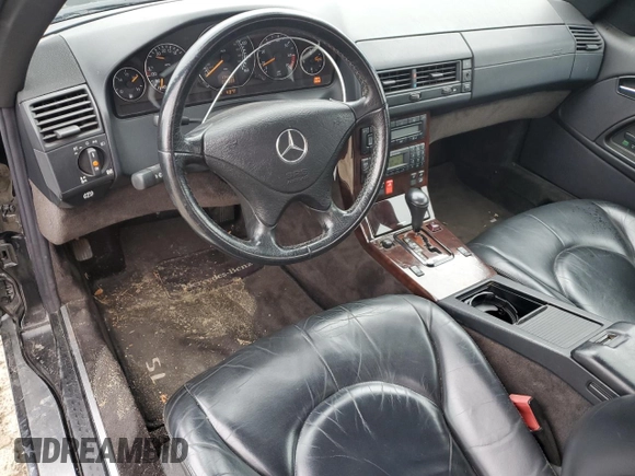 1999 Mercedes-Benz SL-Class with VIN WDBFA68F0XF184008, listed as a Copart auction lot 84998014 with 74,809 mi miles and Salvage Title. Bid and sale history available at carsss.com. Image 8.