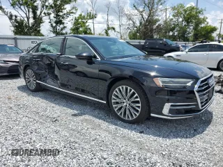2019 Audi A8 with VIN WAU8DAF89KN011642, listed as a Copart auction lot 57915325 with 27,018 mi miles and Salvage title. Bid and sale history available at DreamBid. Image 4.