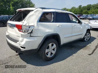 2011 Jeep Grand Cherokee Laredo with VIN 1J4RR4GG6BC657520, listed as a Copart auction lot 63558355 with 215,444 mi miles and Salvage title. Bid and sale history available at DreamBid. Image 3.