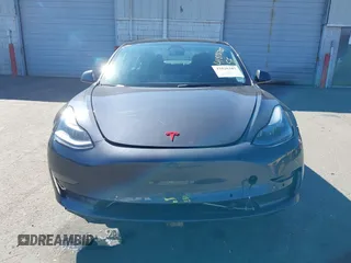 2022 Tesla Model 3 Long Range with VIN 5YJ3E1EB3NF290550, listed as a IAAI auction lot 41826287 with 67,648 mi miles and . Bid and sale history available at DreamBid. Image 13.