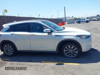 2019 Infiniti QX50 Luxe with VIN 3PCAJ5M10KF128308, listed as a IAAI auction lot 42242771 with 97,257 mi miles and . Bid and sale history available at DreamBid. Image 13.