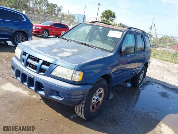 2004 Isuzu Rodeo S with VIN 4S2CK58W944317209, listed as a IAAI auction lot 41498160 with 114,764 mi miles. Bid and sale history available at carsss.com. Image 2.