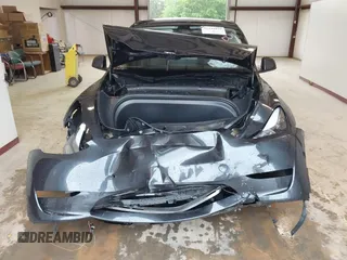 2024 Tesla Model Y с VIN 7SAYGDED4RF072600, выставлен на аукционе IAAI как лот 42242977 с пробегом 8 208 миль миль и . История ставок и продаж доступна на DreamBid. Изображение 6.