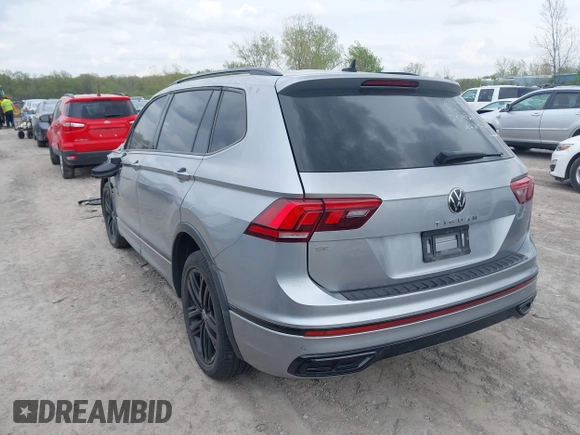 2022 Volkswagen Tiguan SE R-Line Black с VIN 3VVCB7AX1NM065960, выставлен на аукционе IAAI как лот 42149626 с пробегом 71 698 миль миль и . История ставок и продаж доступна на DreamBid. Изображение 3.