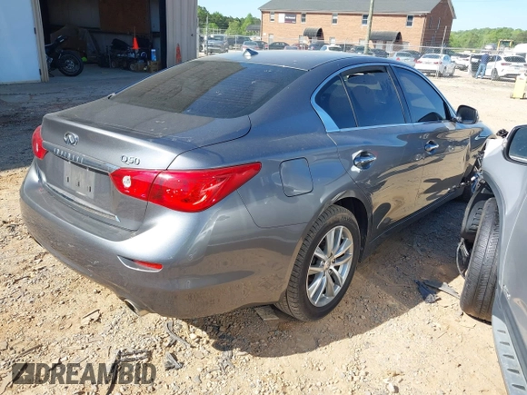 2015 Infiniti Q50 Premium with VIN JN1BV7AP3FM358244, listed as a IAAI auction lot 42063278 with 98,873 mi miles and . Bid and sale history available at DreamBid. Image 4.
