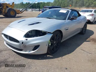 2012 Jaguar XK with VIN SAJWA4EC9CMB45251, listed as a IAAI auction lot 40242636 with 61,538 mi miles. Bid and sale history available at carsss.com. Image 2.