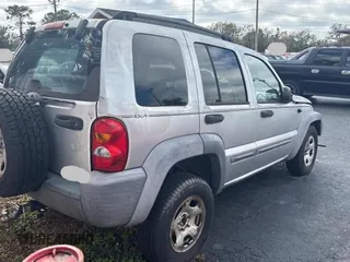 2002 Jeep Liberty Sport with VIN 1J4GL48K72W243074, listed as a Copart auction lot 47081875 with 127,178 mi miles and Clean Title. Bid and sale history available at carsss.com. Image 4.