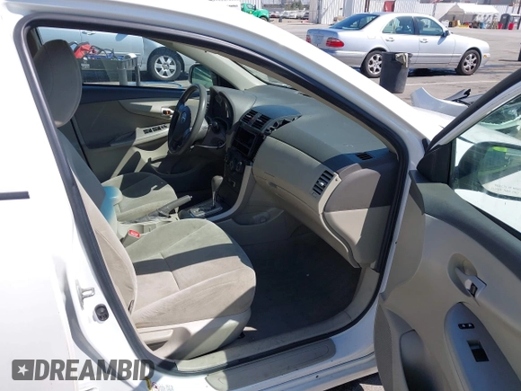 2010 Toyota Corolla with VIN 1NXBU4EE2AZ223753, listed as a IAAI auction lot 42024028 with 204,029 mi miles. Bid and sale history available at carsss.com. Image 5.