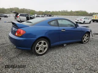 2004 Hyundai Tiburon GT z VIN KMHHN65F04U116166, wystawiony jako Copart lot #51525065 z przebiegiem 153 035 mil mil oraz Szkody całkowita. Historia ofert i sprzedaży dostępna na DreamBid. Obrazek 3.