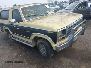 1984 Ford Bronco z VIN 1FMEU15FXELA50791, wystawiony jako IAAI lot #41926107 z przebiegiem 12 469 mil mil oraz . Historia ofert i sprzedaży dostępna na DreamBid. Obrazek 1.