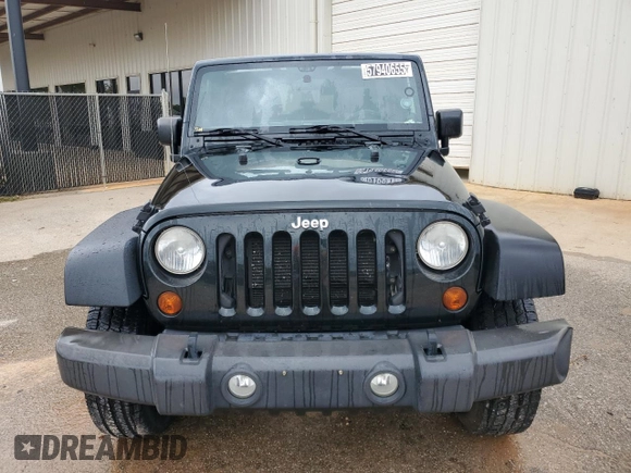 2012 Jeep Wrangler Unlimited Sport z VIN 1C4BJWDG3CL181596, wystawiony jako Copart lot #57940655 z przebiegiem 168 882 mil mil oraz Czysty tytuł • Clean title. Historia ofert i sprzedaży dostępna na DreamBid. Obrazek 5.