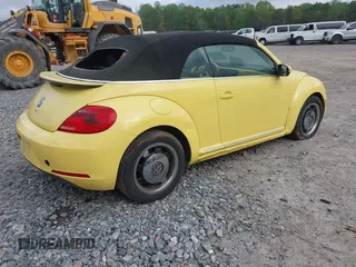 2013 Volkswagen Beetle 2.5L with VIN 3VW5P7AT1DM802091, listed as a IAAI auction lot 41947850 with 92,937 mi miles and . Bid and sale history available at DreamBid. Image 4.