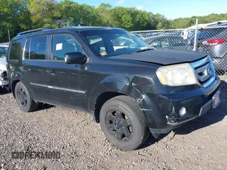 2011 Honda Pilot Touring z VIN 5FNYF4H9XBB070931, wystawiony jako IAAI lot #42276966 z przebiegiem Nie podano mil oraz . Historia ofert i sprzedaży dostępna na DreamBid. Obrazek 1.