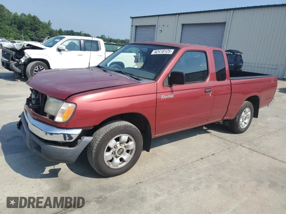 2000 Nissan Frontier XE with VIN 1N6DD26SXYC393054, listed as a Copart auction lot 62410125 with 106,319 mi miles and Salvage title. Bid and sale history available at DreamBid. Image 1.