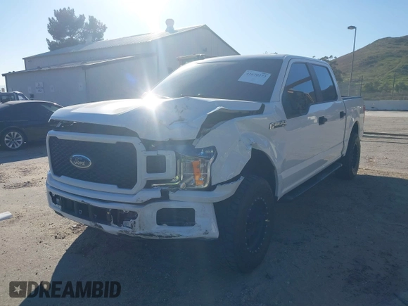 2020 Ford F-150 XL with VIN 1FTEW1CP7LKD24719, listed as a IAAI auction lot 41670273 with 57,188 mi miles. Bid and sale history available at carsss.com. Image 2.