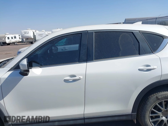 2017 Mazda CX-5 Sport with VIN JM3KFABL5H0124725, listed as a IAAI auction lot 40487298 with 103,889 mi miles. Bid and sale history available at carsss.com. Image 14.