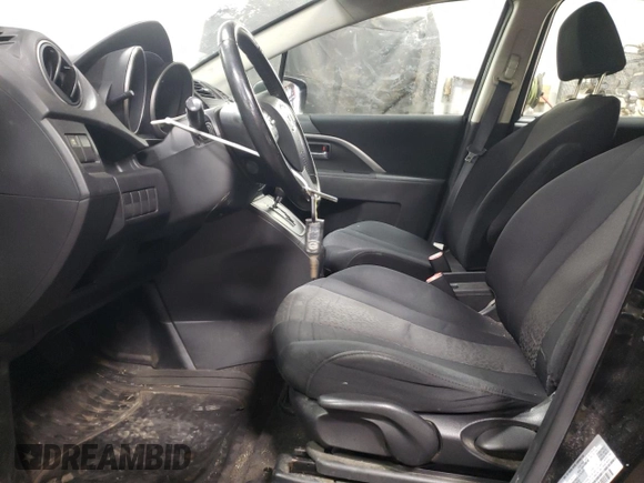 2012 Mazda 5 Touring with VIN JM1CW2CLXC0114623, listed as a Copart auction lot 52036475 with 149,589 mi miles and Salvage Title. Bid and sale history available at DreamBid. Image 7.