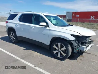 2018 Chevrolet Traverse LT z VIN 1GNEVHKW3JJ125861, wystawiony jako IAAI lot #41876184 z przebiegiem 95 223 mil mil oraz . Historia ofert i sprzedaży dostępna na DreamBid. Obrazek 1.