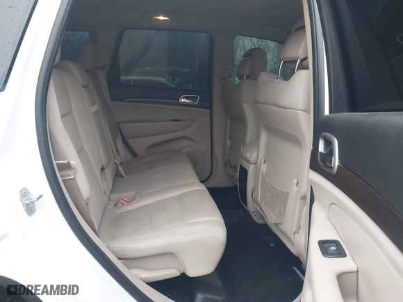 2014 Jeep Grand Cherokee Laredo with VIN 1C4RJEAG0EC510545, listed as a IAAI auction lot 41434776 with 141,789 mi miles. Bid and sale history available at carsss.com. Image 8.