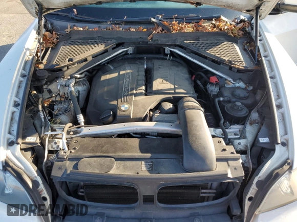 2012 BMW X5 35i with VIN 5UXZV4C55CL747778, listed as a Copart auction lot 84335374 with 144,258 mi miles and Non repairable. Bid and sale history available at DreamBid. Image 12.