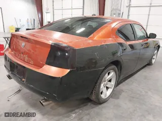2006 Dodge Charger R/T with VIN 2B3KA53H56H195653, listed as a IAAI auction lot 39254908 with 164,629 mi miles. Bid and sale history available at carsss.com. Image 4.