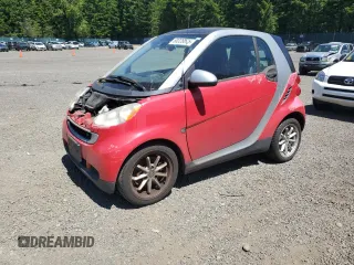 2009 Smart fortwo Pure z VIN WMEEJ31X29K236894, wystawiony jako Copart lot #60328875 z przebiegiem 109 337 mil mil oraz Czysty tytuł • Clean title. Historia ofert i sprzedaży dostępna na DreamBid. Obrazek 1.