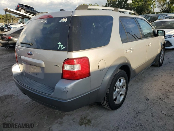 2007 Ford Freestyle SEL with VIN 1FMDK02177GA39019, listed as a Copart auction lot 73844164 with 185,083 mi miles and Salvage Title. Bid and sale history available at carsss.com. Image 3.