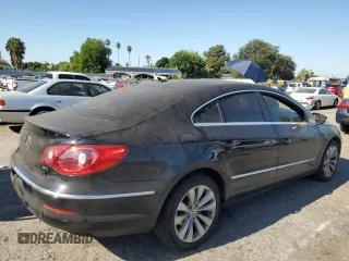 2010 Volkswagen CC Sport with VIN WVWML7AN0AE517475, listed as a Copart auction lot 67077014 with 147,478 mi miles and Salvage Title. Bid and sale history available at carsss.com. Image 3.