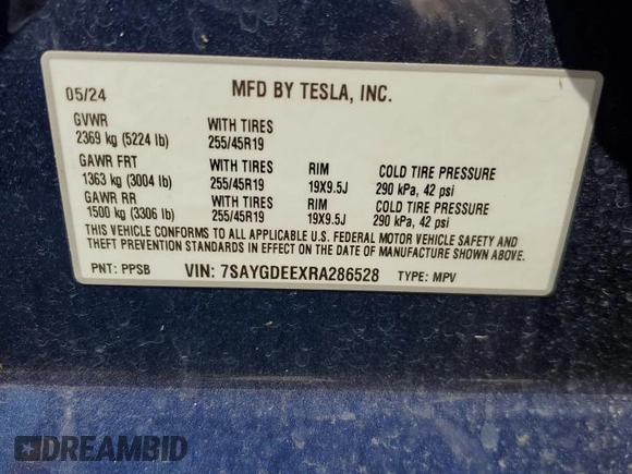 2024 Tesla Model Y Long Range with VIN 7SAYGDEEXRA286528, listed as a Copart auction lot 56321585 with Not provided miles and Salvage title. Bid and sale history available at DreamBid. Image 12.