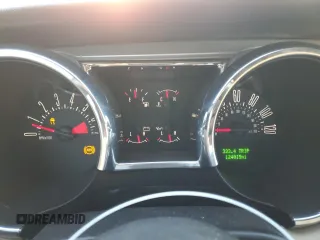 2008 Ford Mustang Deluxe with VIN 1ZVHT84N985180475, listed as a Copart auction lot 87002774 with 124,015 mi miles and Salvage Title. Bid and sale history available at carsss.com. Image 9.