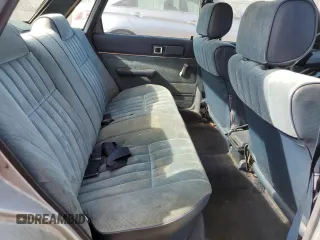 1986 Toyota Camry z VIN JT2SV12E3G6021210, wystawiony jako Copart lot #49623985 z przebiegiem 144 064 mil mil oraz Czysty tytuł • Clean title. Historia ofert i sprzedaży dostępna na DreamBid. Obrazek 10.