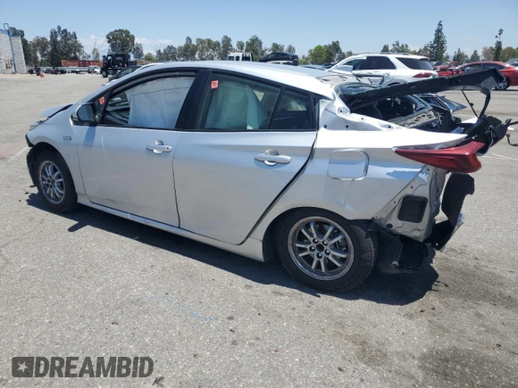2021 Toyota Prius LE z VIN JTDKAMFPXM3169514, wystawiony jako Copart lot #63255095 z przebiegiem 49 546 mil mil oraz Szkoda całkowita • Salvage title. Historia ofert i sprzedaży dostępna na DreamBid. Obrazek 2.