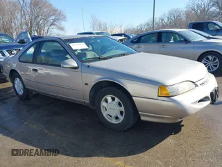 1995 Ford Thunderbird LX with VIN 1FALP62W9SH206490, listed as a IAAI auction lot 41744430 with 111,365 mi miles. Bid and sale history available at carsss.com. Image 13.