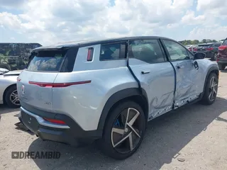 2023 Fisker Ocean One z VIN VCF1ZBU22PG006157, wystawiony jako IAAI lot #41887759 z przebiegiem 3322 mil mil oraz . Historia ofert i sprzedaży dostępna na DreamBid. Obrazek 4.