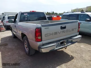 2005 Chevrolet Silverado 1500 Work Truck with VIN 1GCEC14X45Z106318, listed as a IAAI auction lot 41819033 with 153,997 mi miles. Bid and sale history available at carsss.com. Image 3.
