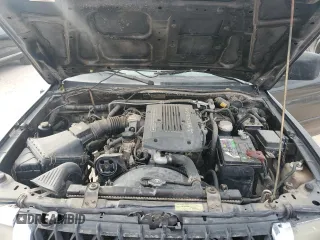2000 Mitsubishi Montero Sport LS with VIN JA4LS31H9YP007670, listed as a Copart auction lot 86809344 with 239,106 mi miles and Salvage Title. Bid and sale history available at carsss.com. Image 12.