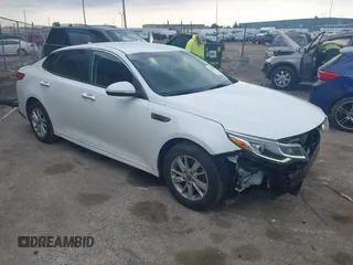 2019 Kia Optima LX z VIN 5XXGT4L32KG281528, wystawiony jako IAAI lot #42113180 z przebiegiem 107 281 mil mil oraz . Historia ofert i sprzedaży dostępna na DreamBid. Obrazek 1.