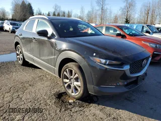2023 Mazda CX-30 S Select with VIN 3MVDMBBM9PM524187, listed as a Copart auction lot 46709355 with 25,244 mi miles and Salvage Title. Bid and sale history available at DreamBid. Image 4.