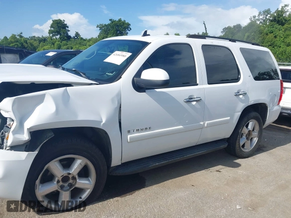2007 Chevrolet Tahoe LT with VIN 1GNFC13J97R314853, listed as a IAAI auction lot 42684980 with 312,399 mi miles and . Bid and sale history available at DreamBid. Image 14.
