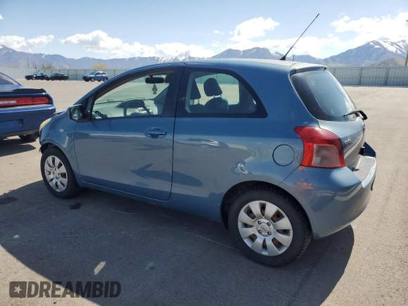 2008 Toyota Yaris with VIN JTDJT923185164654, listed as a Copart auction lot 54052575 with 242,505 mi miles and Salvage Title. Bid and sale history available at DreamBid. Image 2.