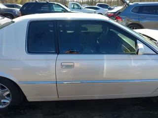 2000 Cadillac Eldorado ESC with VIN 1G6EL12Y0YB702778, listed as a IAAI auction lot 41988107 with 203,526 mi miles. Bid and sale history available at carsss.com. Image 13.