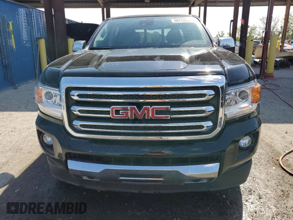 2018 GMC Canyon 4WD SLT with VIN 1GTG6DEN2J1312924, listed as a Copart auction lot 50728555 with 89,853 mi miles and Salvage Title. Bid and sale history available at carsss.com. Image 5.