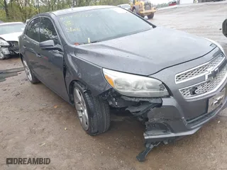 2013 Chevrolet Malibu LTZ with VIN 1G11H5SA1DF286288, listed as a IAAI auction lot 40457277 with 216,703 mi miles. Bid and sale history available at carsss.com. Image 6.