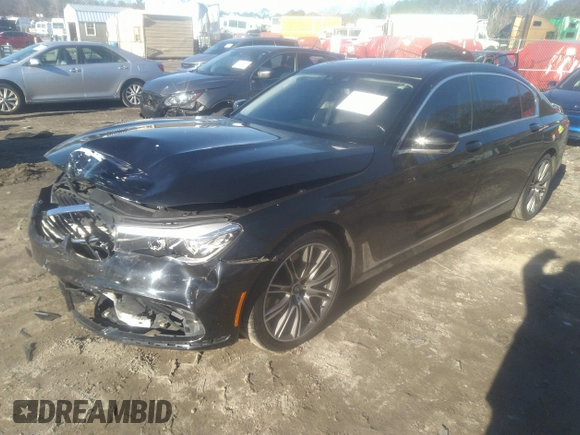 2018 BMW 7 Series 740i with VIN WBA7E2C57JG742257, listed as a IAAI auction lot 41353435 with 77,125 mi miles. Bid and sale history available at carsss.com. Image 18.