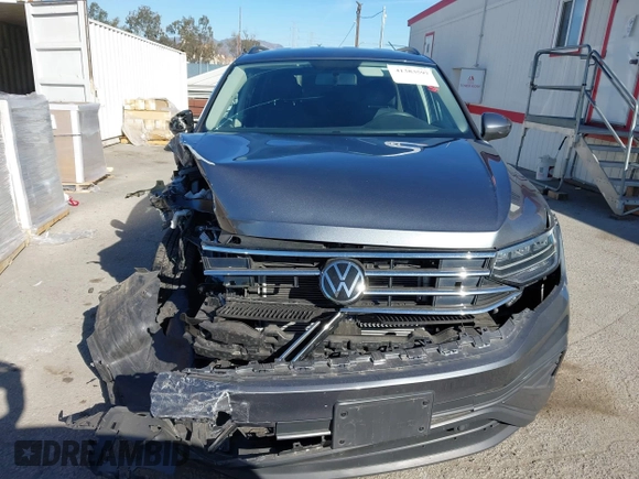 2022 Volkswagen Tiguan S with VIN 3VV1B7AX9NM055507, listed as a IAAI auction lot 41383597 with 25,546 mi miles and . Bid and sale history available at DreamBid. Image 13.