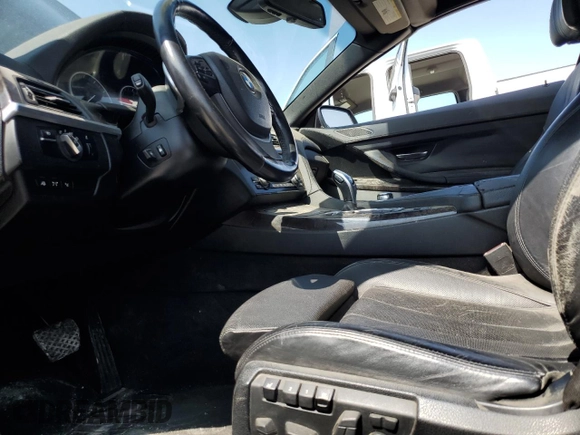 2012 BMW 6 Series 650i z VIN WBALZ3C55CDL70172, wystawiony jako Copart lot #58656785 z przebiegiem 104 657 mil mil oraz Czysty tytuł • Clean title. Historia ofert i sprzedaży dostępna na DreamBid. Obrazek 7.